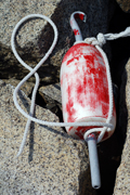 red buoy on granite